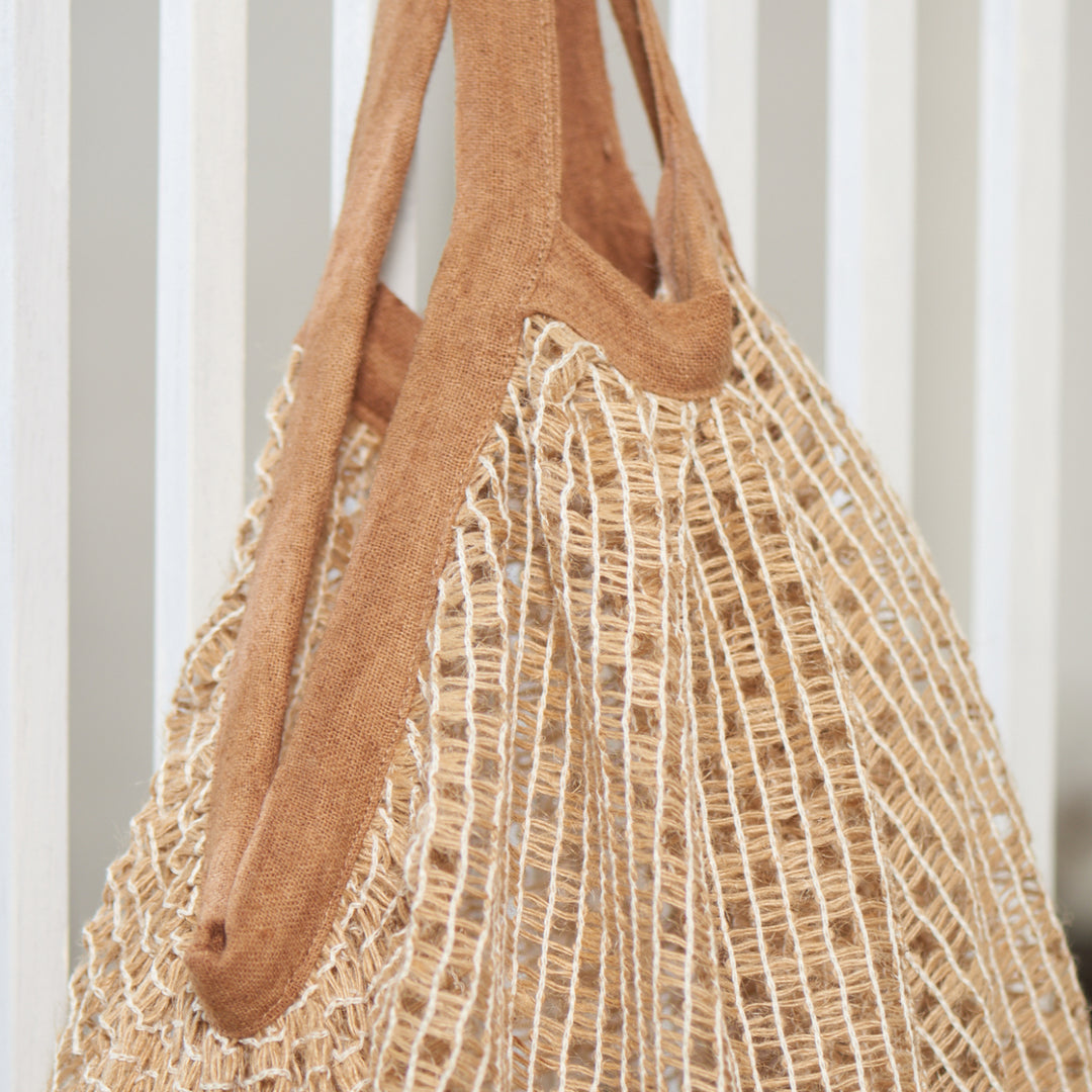 tote bag size 20 inches wide by 18 inches long stretches up to 20 inches long. 